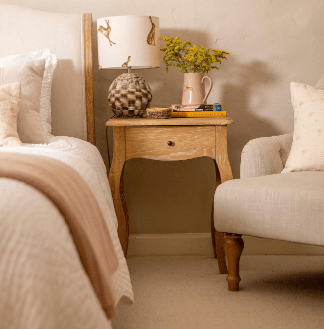 wooden nightstand with lamp